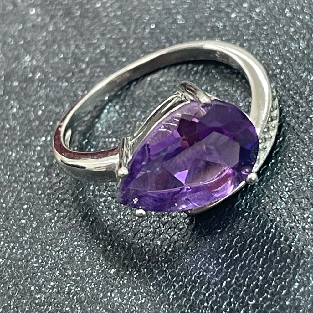 Unheated, purple pear amethyst and white topaz sterling silver ring. Size 6.